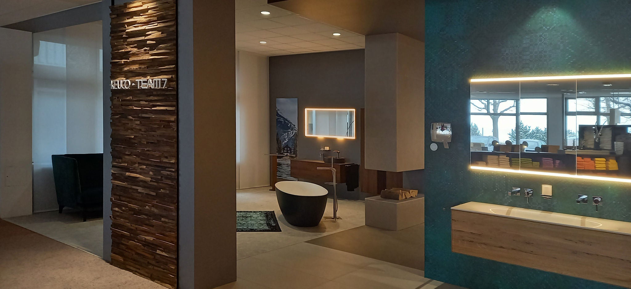 KEUCO EDITION LIGNATUR at the point of sale with forest edge and company logos