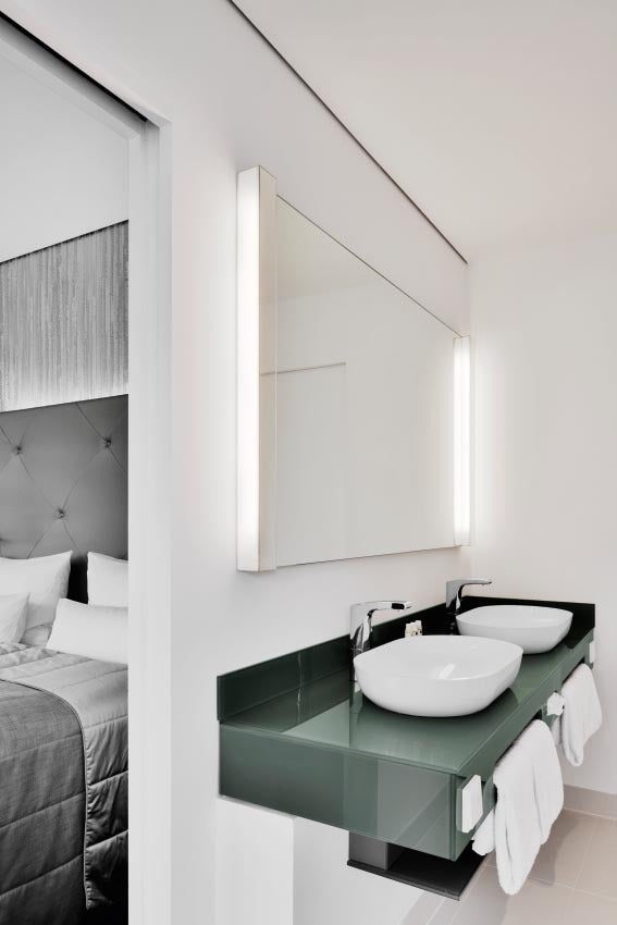 Double washbasin in a suite at Hotel COSMO Berlin