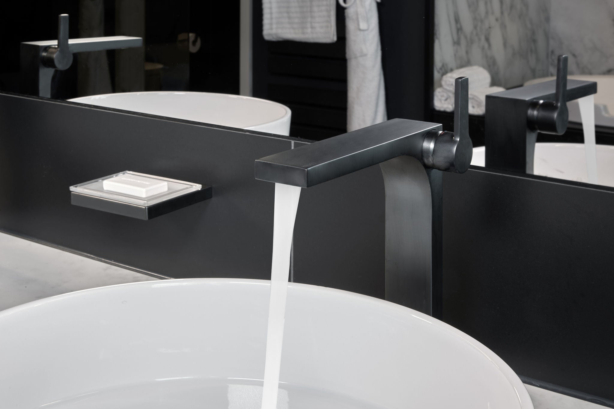 Double washbasin with EDITION 11 black brushed fitting in Le Meridien Hamburg