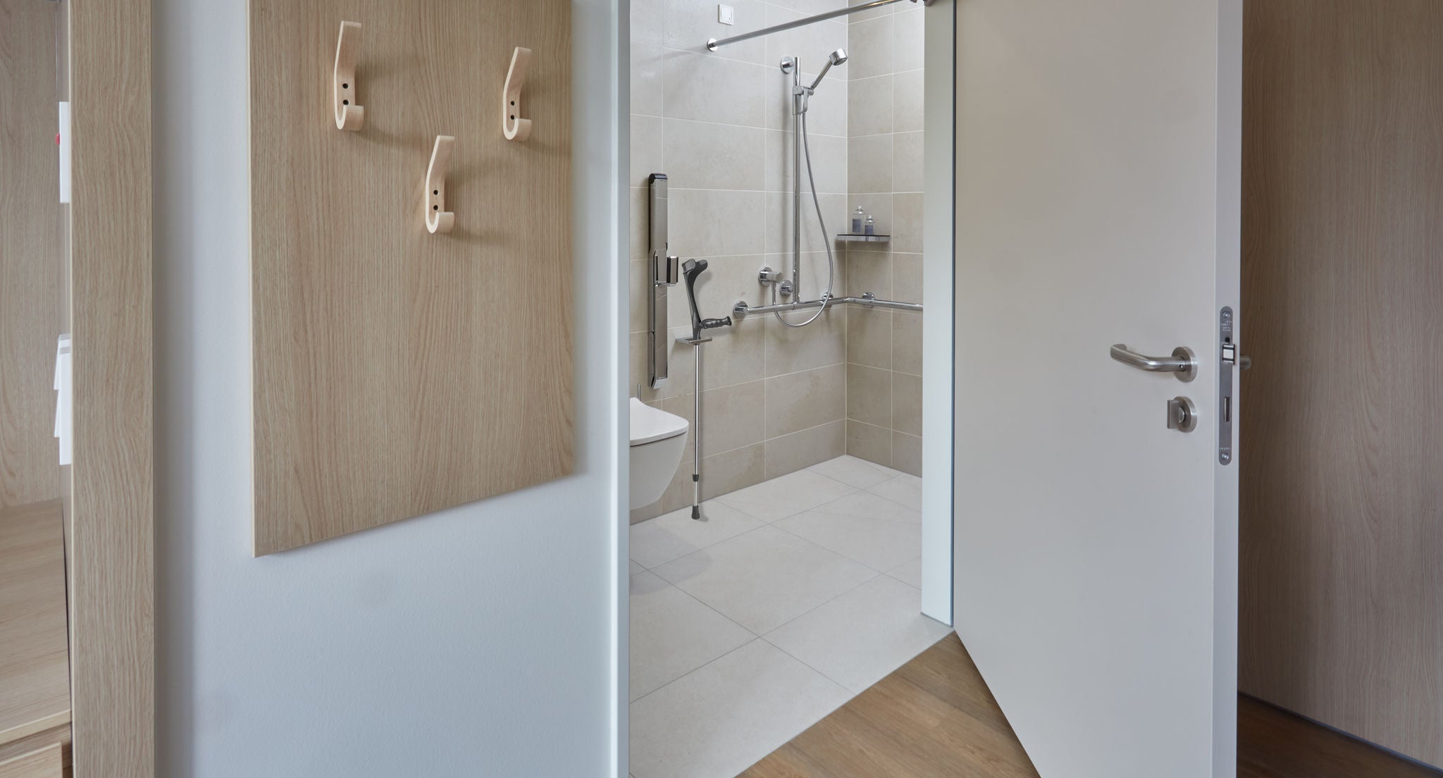 View of the shower and toilet area at Eisenberg Rehabilitation Clinic with PLAN and IXMO products