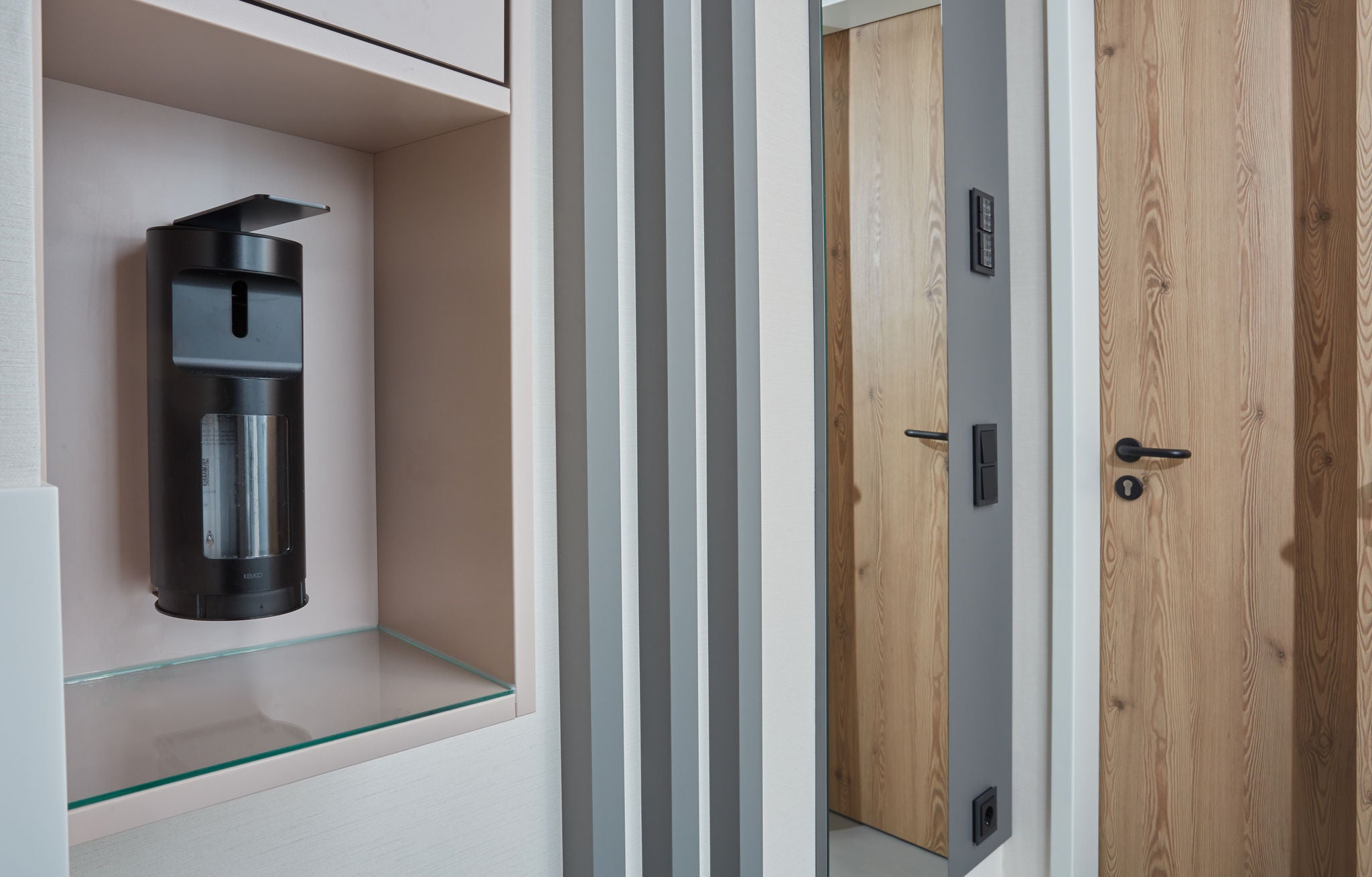 PLAN CARE liquid soap/disinfectant dispenser in matt black at RWTH Aachen-Franziskus University Hospital