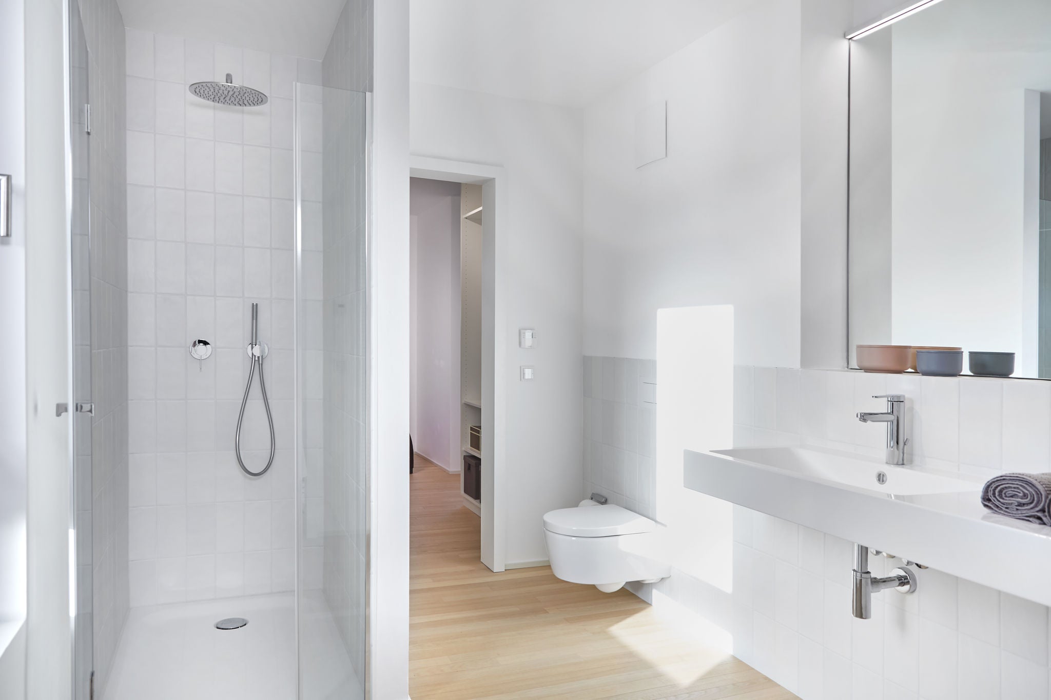 Shower with IXMO and washbasin with PLAN BLUE in private house in Herrsching