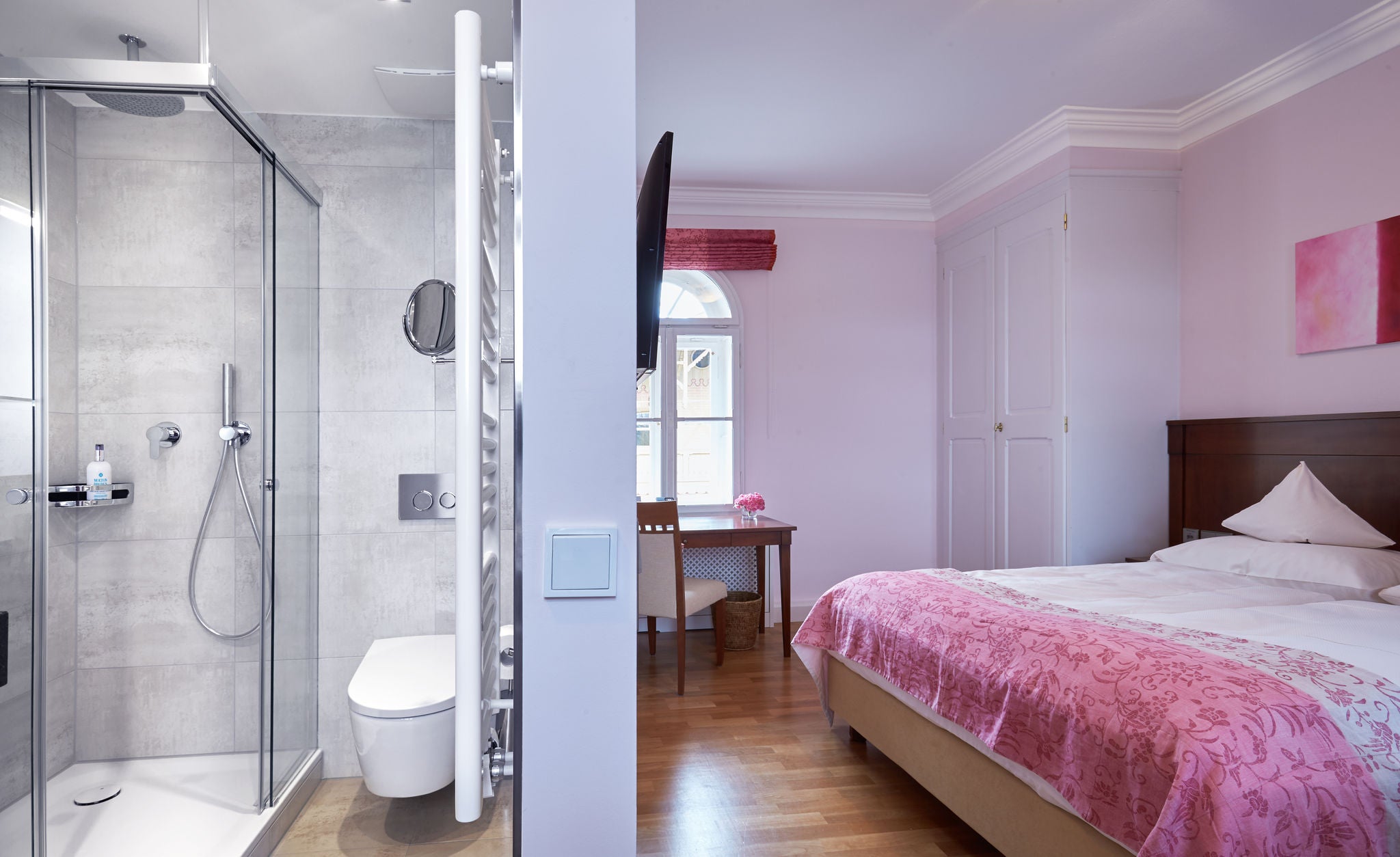 Interior view of room with bathroom at Hotel La Villa